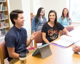 Students studying in the library.