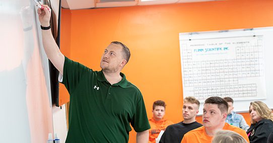 Professor teaches criminal justice class.