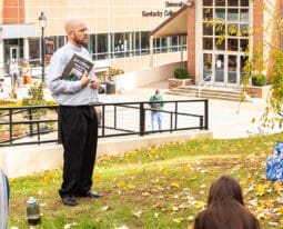 Chaplain teaching class outside.