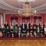 a group portrait of alumni and friends seated at the greenbriar in west virginia.