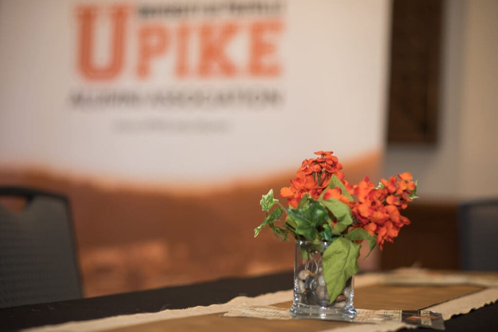 event table photo with orange flowers