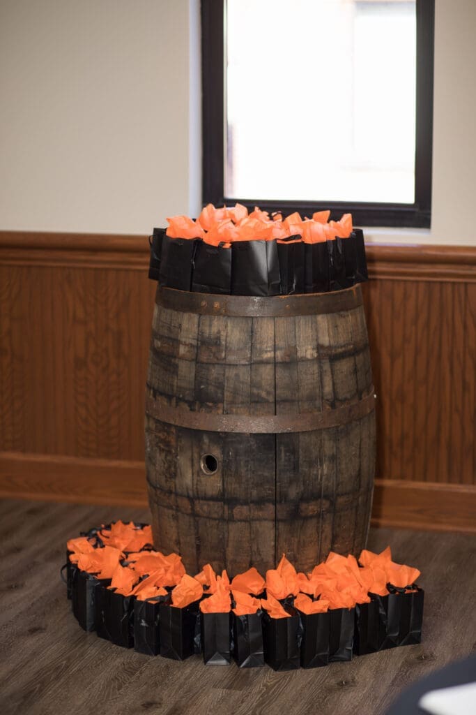 gifts on top of bourbon barrel