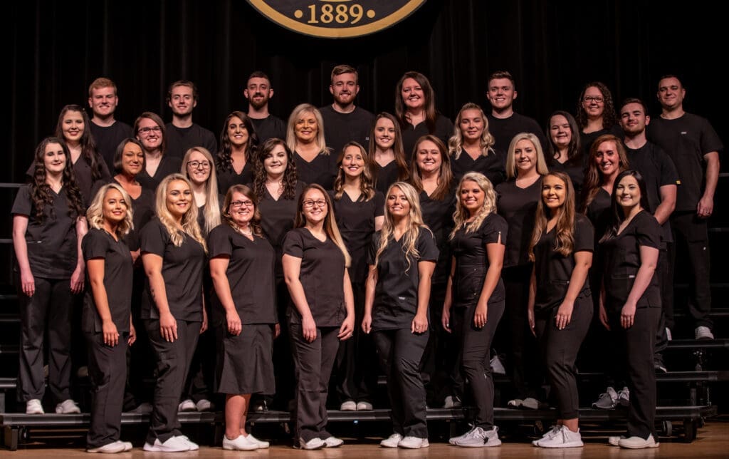 2019 nursing graduates pose for group photo during their pinning ceremony