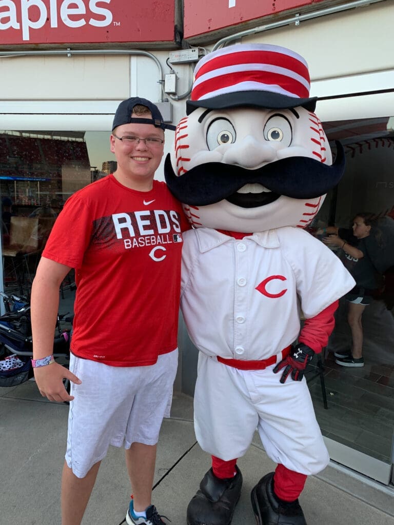 Event attendees enjoys visit with Reds mascot