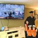 jeremy goodson celebrating graduating at home