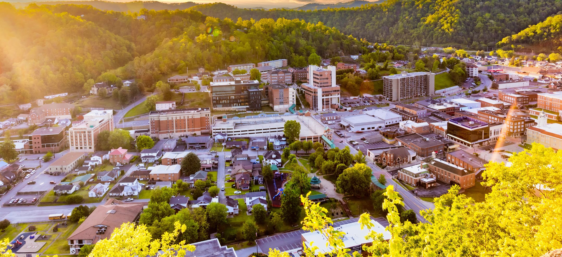 sunny photo of campus from mountain