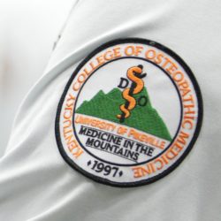 KYCOM white coat patch