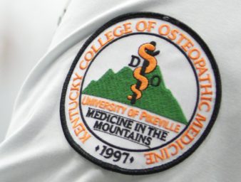 KYCOM white coat patch