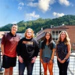 Wells Family and two UPIKE scholarship recipients