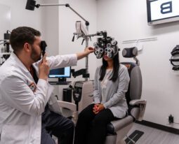 optometry school resident performing exam on model