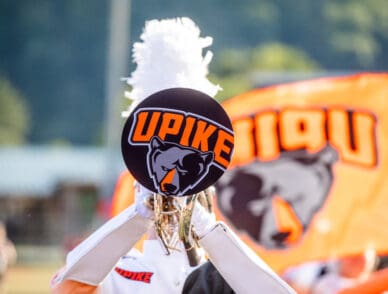 close up of a UPIKE marching band trumpet player
