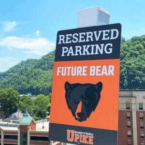 Parking sign that reads "Reserved Parking Future Bear"
