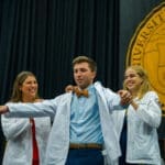 KYCOM student receiving White Coat