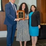 Dean of KYCO Dr. Bacigalupi and his wife award KYCO graduate Colette Houssan '23