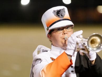 marching band student Amy Smallwood performs at halftime