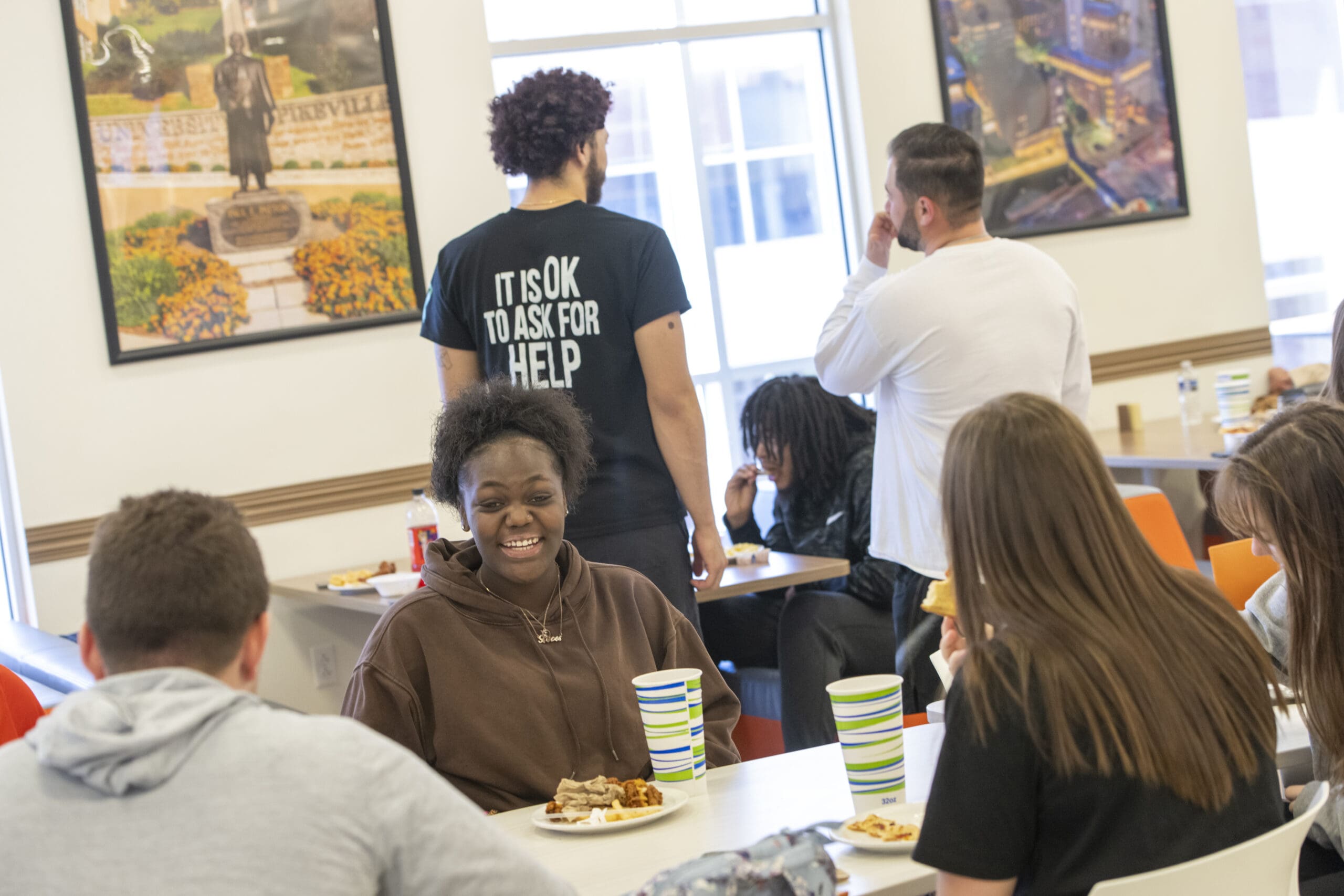 students sit during lunch period in cafeteria