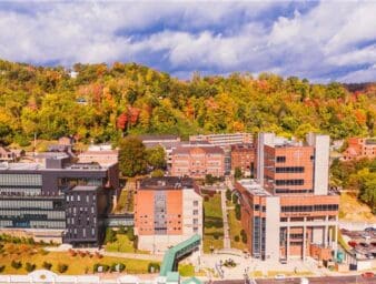 drone photo of university campus during fall