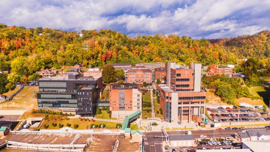 drone photo of university campus during fall