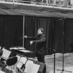 UPIKE Band Director Slade Denman conducting