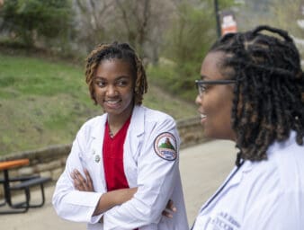 KYCOM students smiling in the plaza