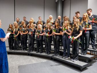 Nursing graduates reciting the Florence Nightingale Pledge.