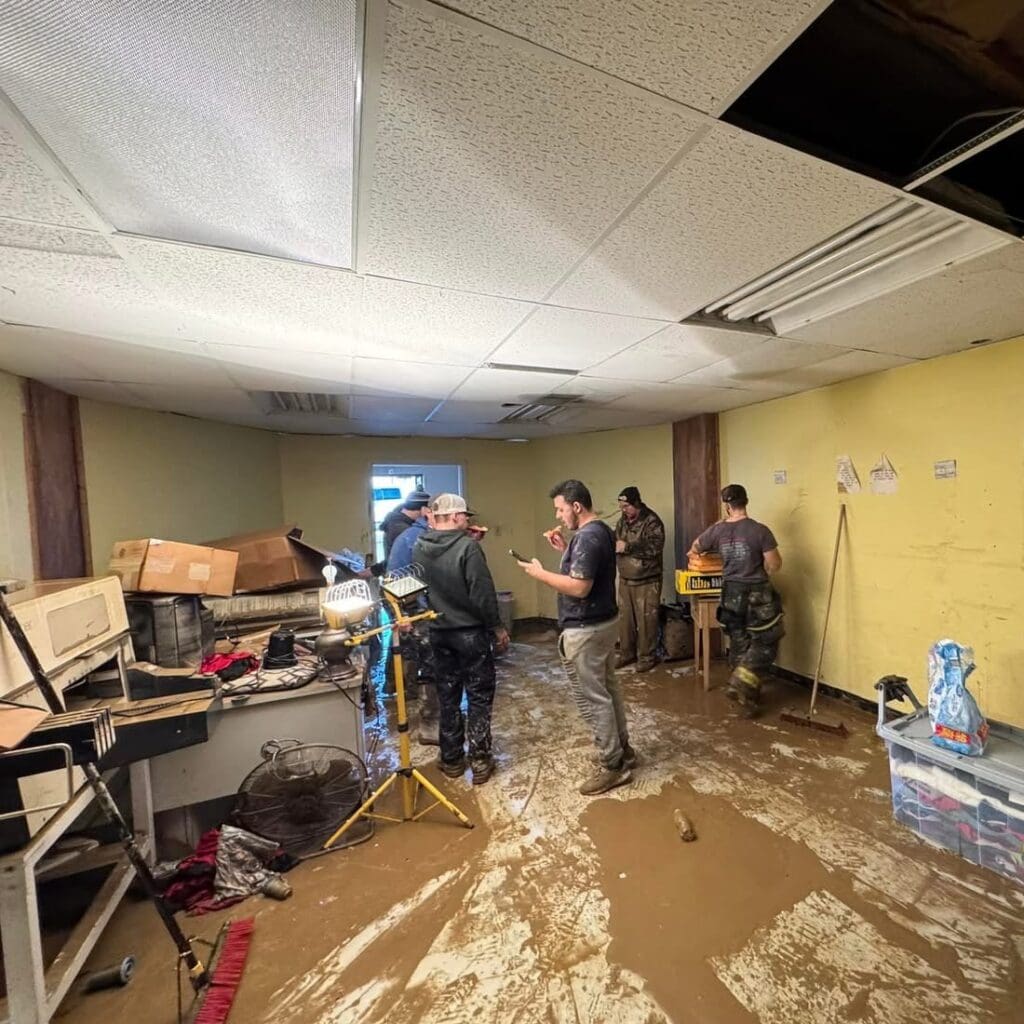 UPIKE Students helping clean up flood damage