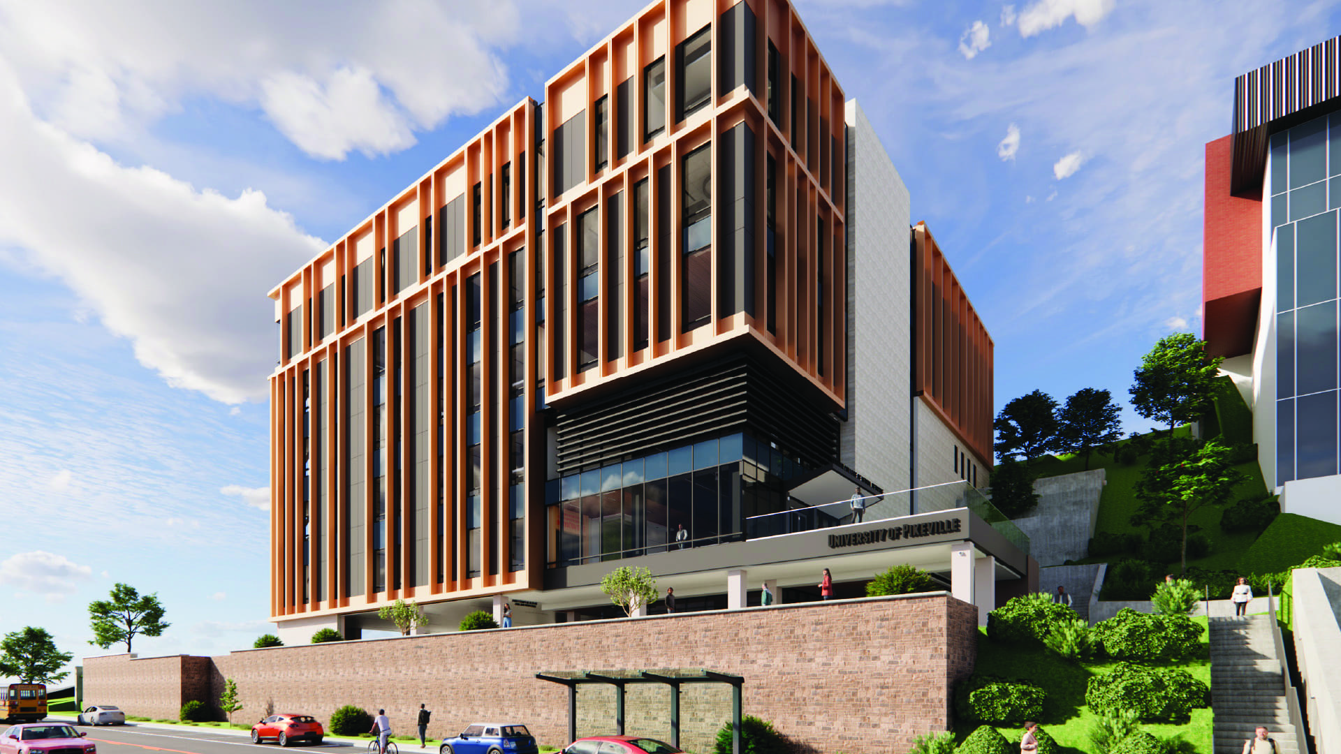 Architectural rendering of a modern academic building at the University of Pikeville - Tanner College of Dental Medicine. The structure features a striking design with vertical orange accents, dark paneling, and large glass windows. It sits elevated on a brick retaining wall with landscaping and staircases integrated into the hillside. The building's facade includes the text 'University of Pikeville' above the entrance. Several people are visible walking on the sidewalk, ascending stairs, or inside the building. The sky is bright with scattered clouds, and there are cars parked along the street below. The design combines contemporary materials with functional outdoor space, emphasizing elevation and accessibility.