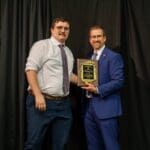 Luke T. Adkinson, D.O., accepts the Stephen M. Payson, M.S., Memorial Scholarship Award, presented by Dean of the Kentucky College of Osteopathic Medicine, Joe Kingery, D.O., MBA, FACOFP, FAAFP.