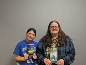 Left, English Club Vice President Kaileigh Chaney; right, English Club President Halley Winstead