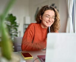 Woman working on her laptop.