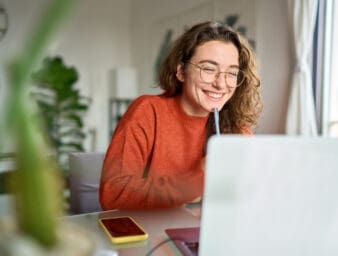 Woman working on her laptop.