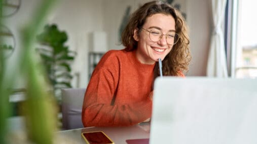 Woman working on her laptop.