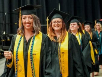 Graduates of social work lined up at commencement.