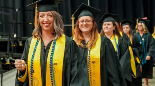 Graduates of social work lined up at commencement.