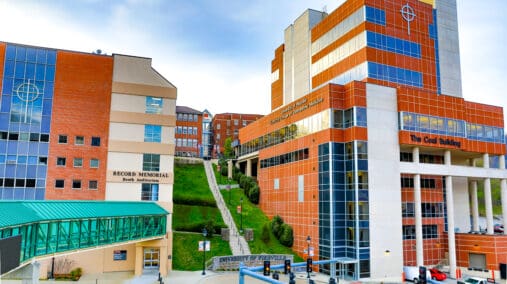 A wide shot of campus from the point of view of Hambley Blvd.