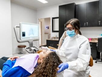 Child getting a dental exam