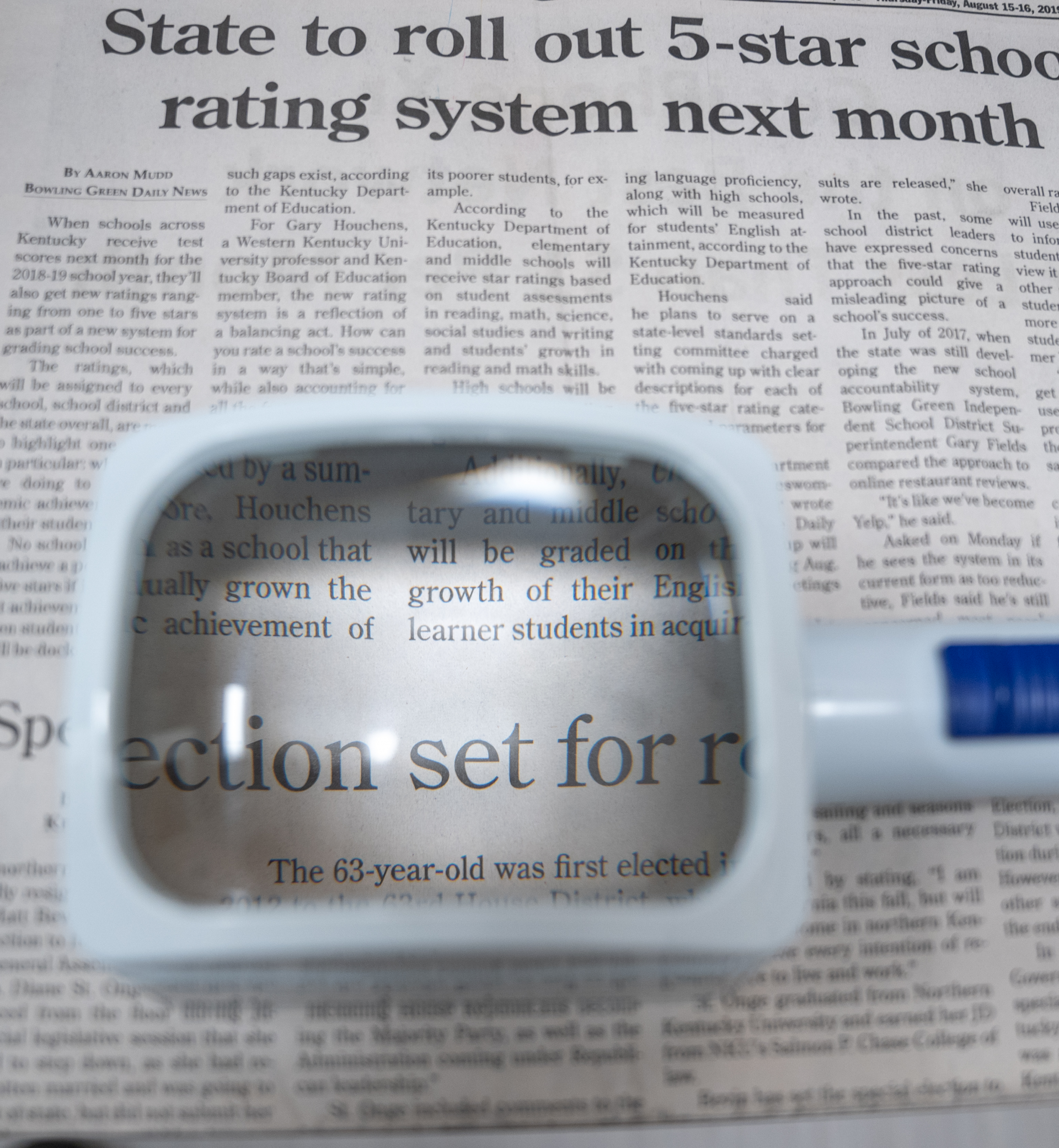 Low vision tool on newspaper
